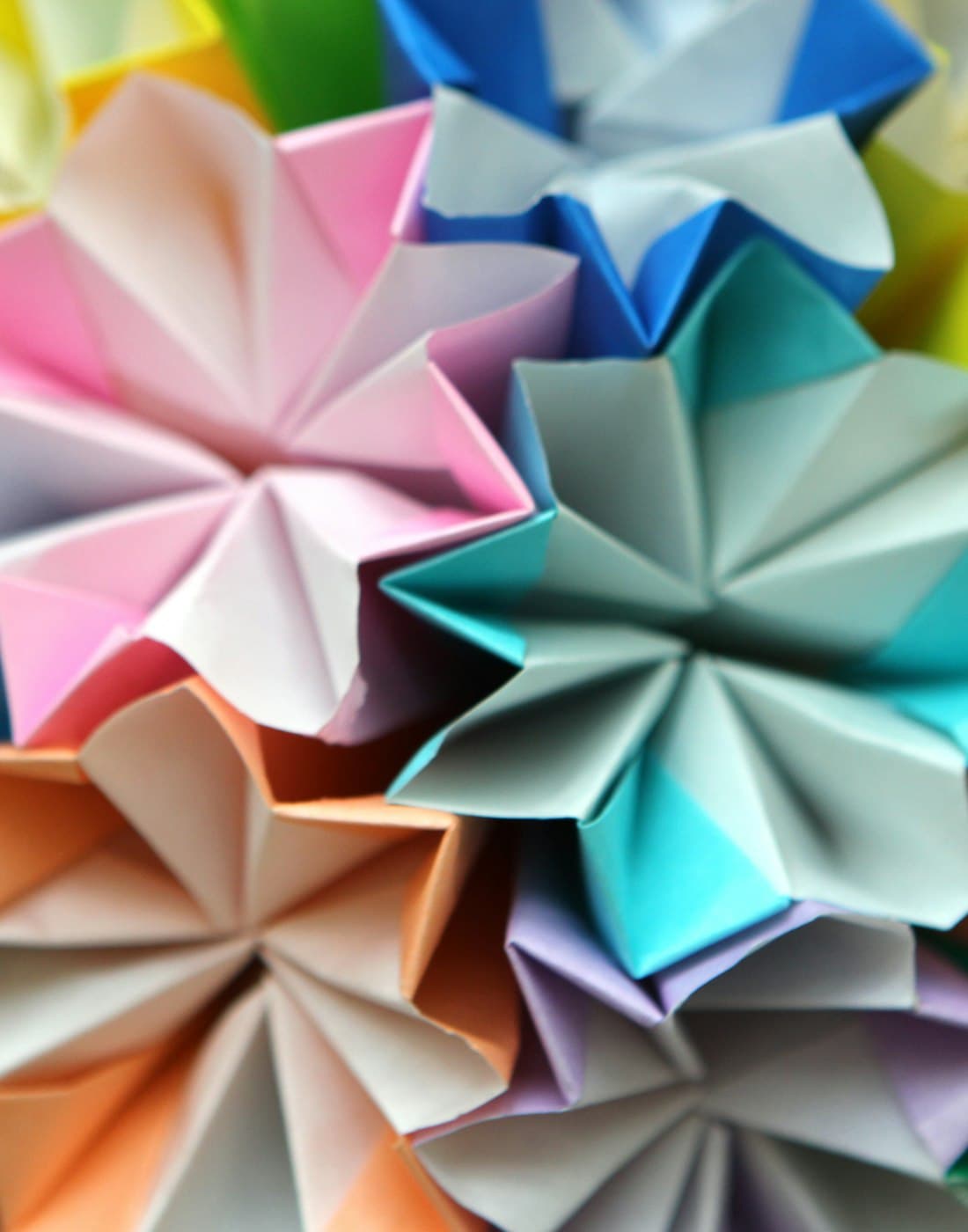 A cluster of soft handmade craft flowers